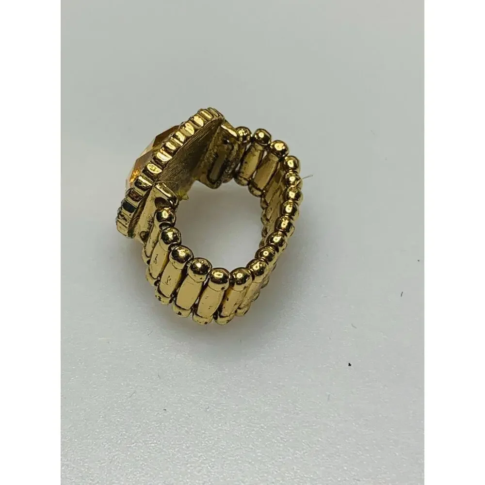 Gold Tone Stretchy Ring with Large Gold Stone Surrounded by Rhinestones